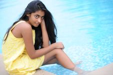 Girl Sitting At Pool Royalty Free Stock Images