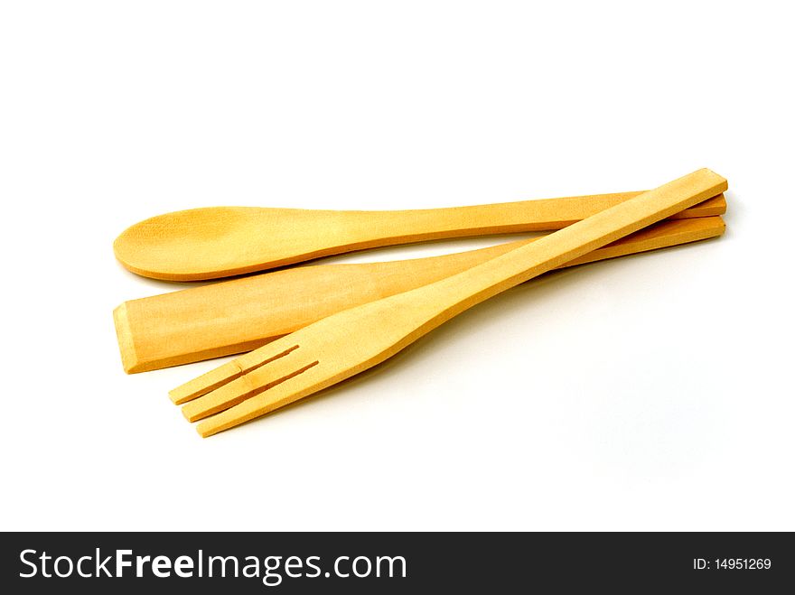 Wooden  kitchenware against white background