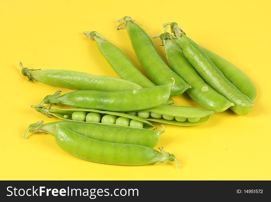 Green Pea on the yellow background