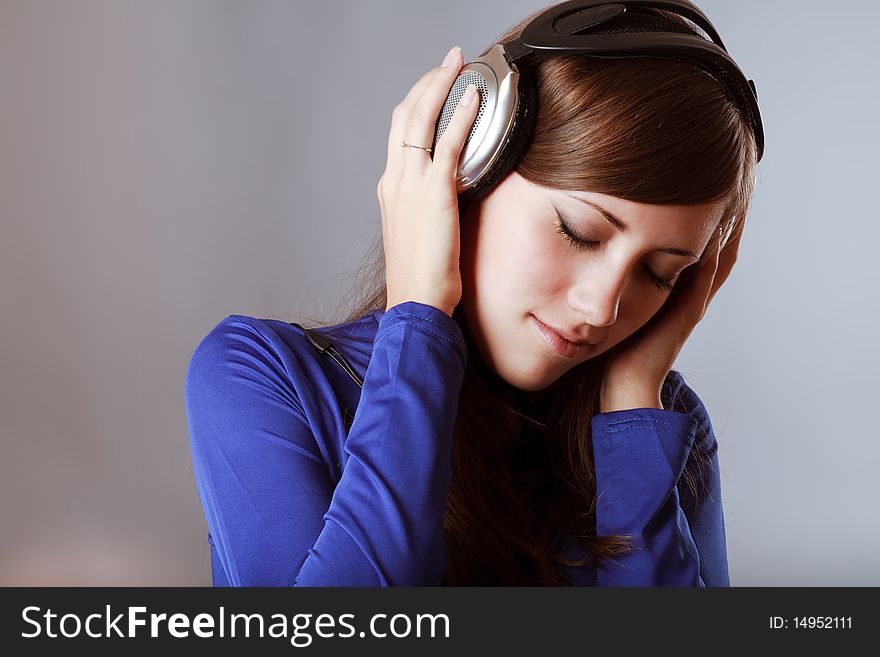 Beautiful Headphones Girl on blue background