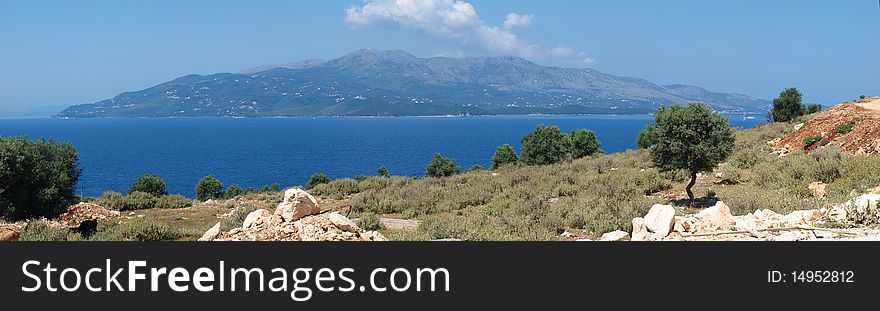 Greek island Corfu seen from Albanian coast near the city of Ksamil. Greek island Corfu seen from Albanian coast near the city of Ksamil