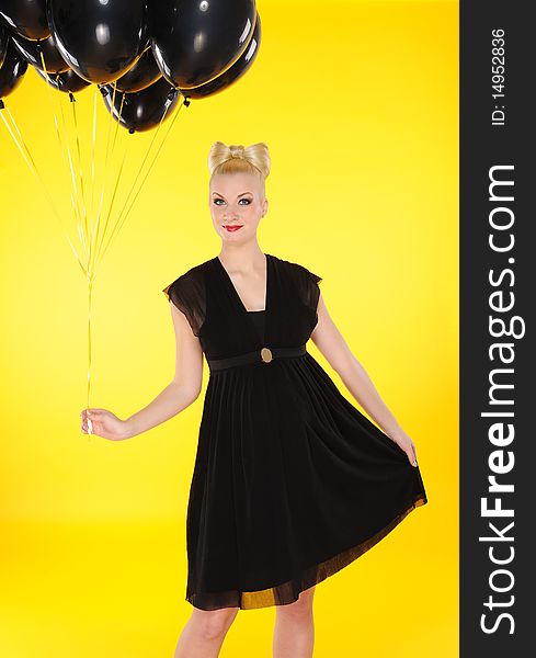 Lovely lady with black balloons