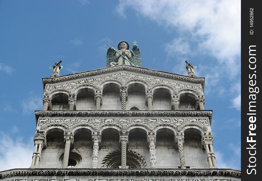 Detail of the beautiful facade of the Saint Michael (San Michele) church in Lucca, Tuscany, Italy. Detail of the beautiful facade of the Saint Michael (San Michele) church in Lucca, Tuscany, Italy