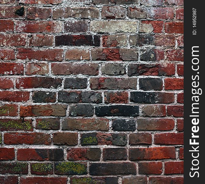 Aging brick wall. grunge background.