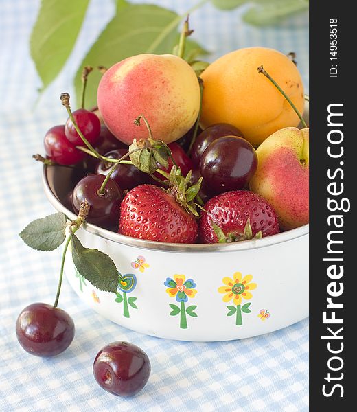 Fresh apricots, cherry and strawberry in bowl. Fresh apricots, cherry and strawberry in bowl
