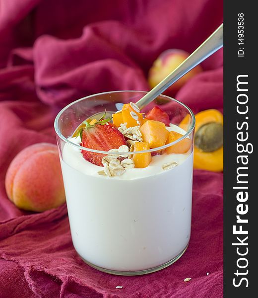 Yogurt with muesli and berries for breakfast