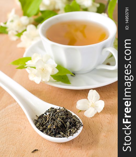 Organic jasmine tea with fresh jasmine flowers. Organic jasmine tea with fresh jasmine flowers.