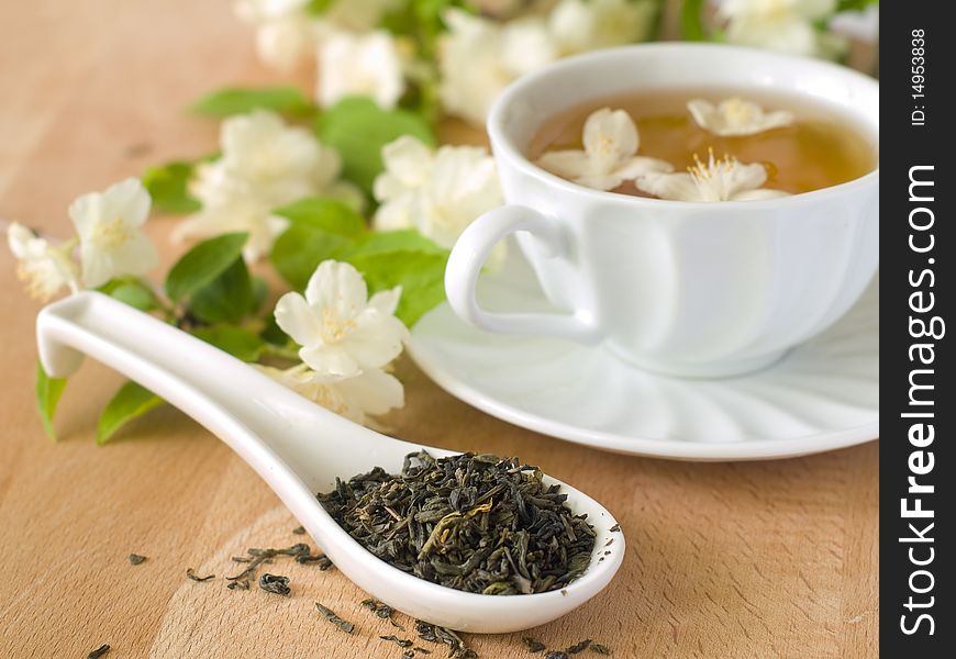 Organic jasmine tea with fresh jasmine flowers. Organic jasmine tea with fresh jasmine flowers.