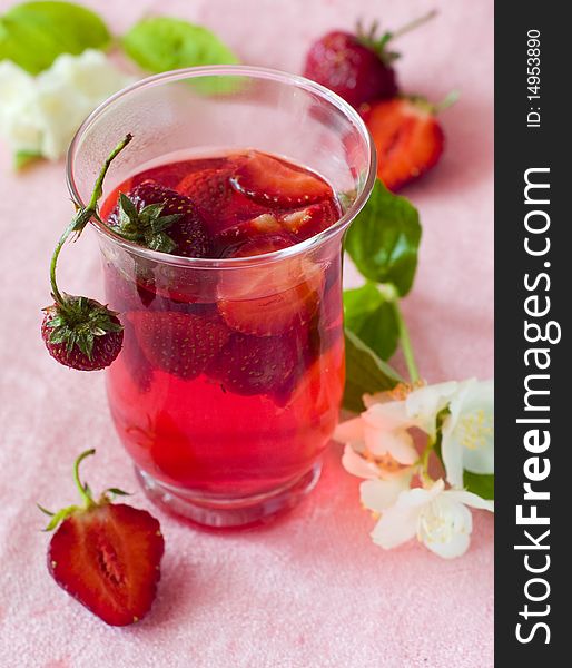 Strawberry  tea in a glass with fresh strawberry