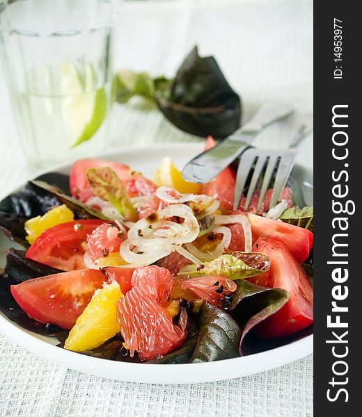 Appetizer with orange and grapefruit with olive oil and pepper. Appetizer with orange and grapefruit with olive oil and pepper