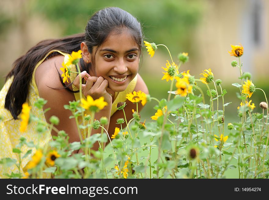 Indian beautiful girl enjoying domestic garden. Indian beautiful girl enjoying domestic garden