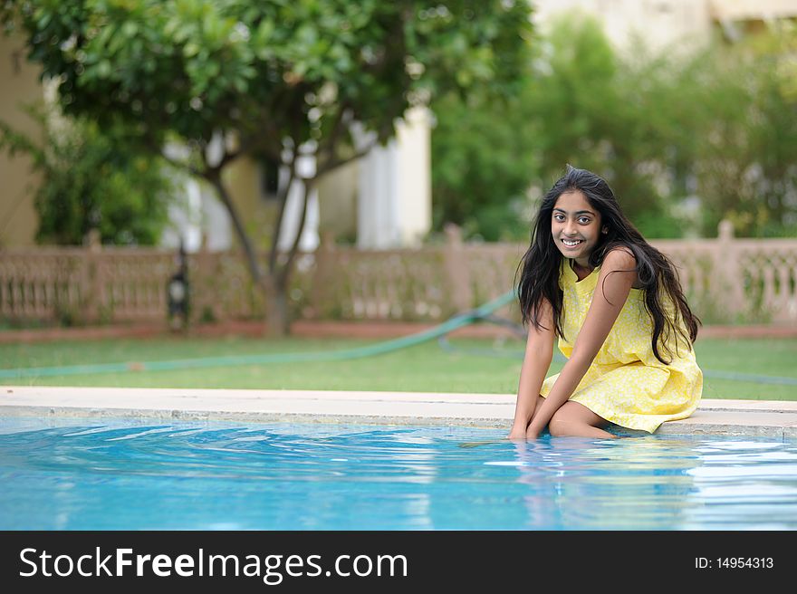Indian Girl enjoying summer at pool. Indian Girl enjoying summer at pool
