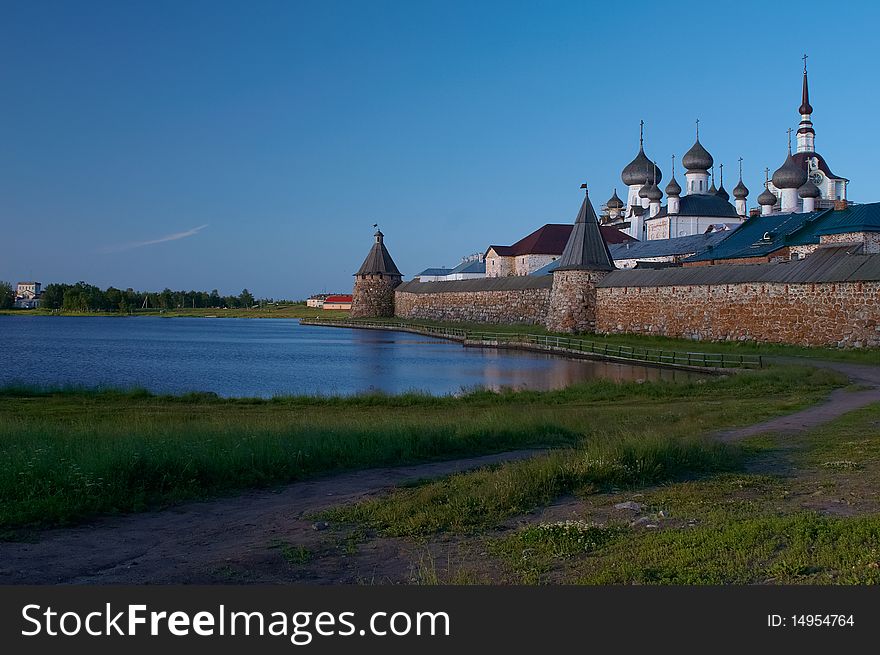 Old round stone tower in Solovetsky monastery with blue sky background, Karelia, Russian Federation. Old round stone tower in Solovetsky monastery with blue sky background, Karelia, Russian Federation.