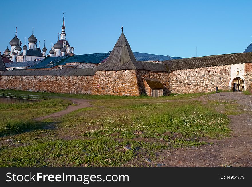 Old round stone tower in Solovetsky monastery with blue sky background, Karelia, Russian Federation. Old round stone tower in Solovetsky monastery with blue sky background, Karelia, Russian Federation.