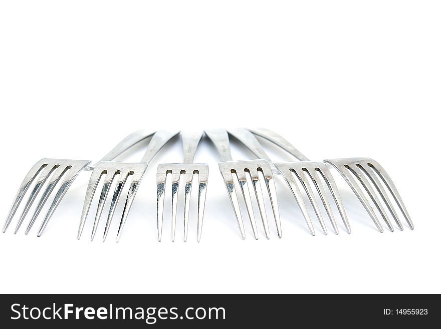 Group of Forks from the aged metal. Isolated on white