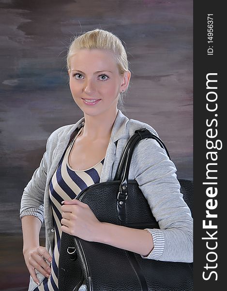 Young woman 20-25 years with road bag