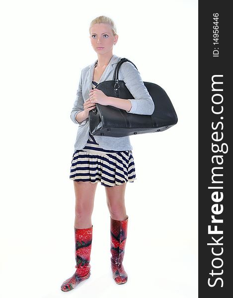 Young adult woman with road bag