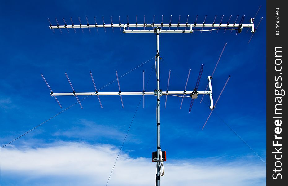 Television antenna and blue sky. Television antenna and blue sky