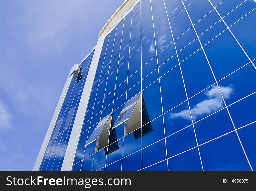 Glass building and sky reflection. Glass building and sky reflection