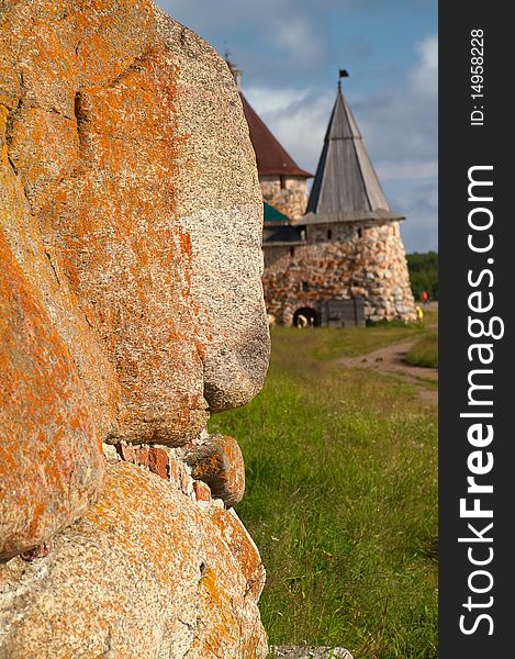 Old round stone tower in Solovetsky monastery with blue sky background, Karelia, Russian Federation. Old round stone tower in Solovetsky monastery with blue sky background, Karelia, Russian Federation.