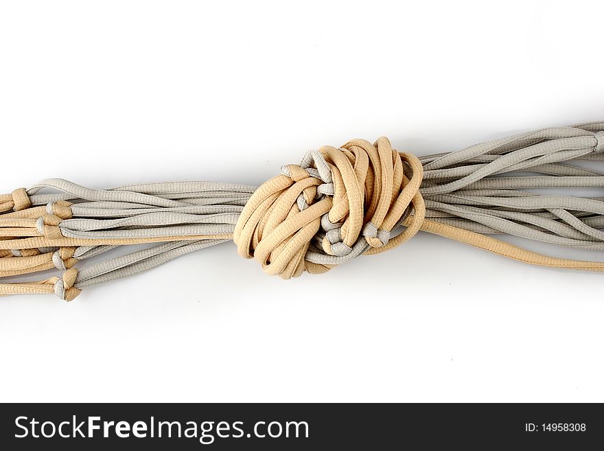 Rope with knot close up. Isolated on white background.