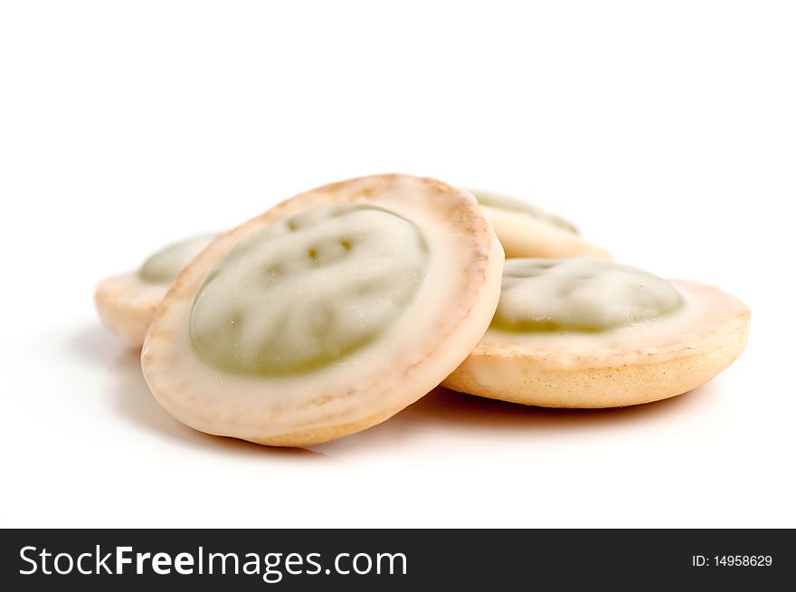 Cookies in white glaze on a white background