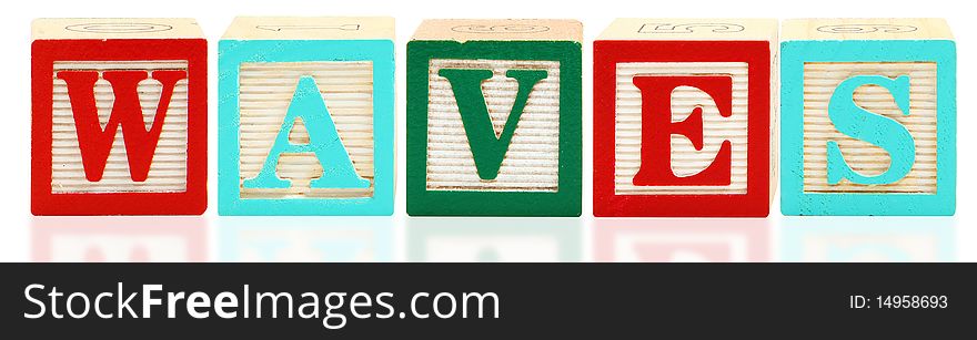 Colorful alphabet blocks. spelling out the word waves. Colorful alphabet blocks. spelling out the word waves.