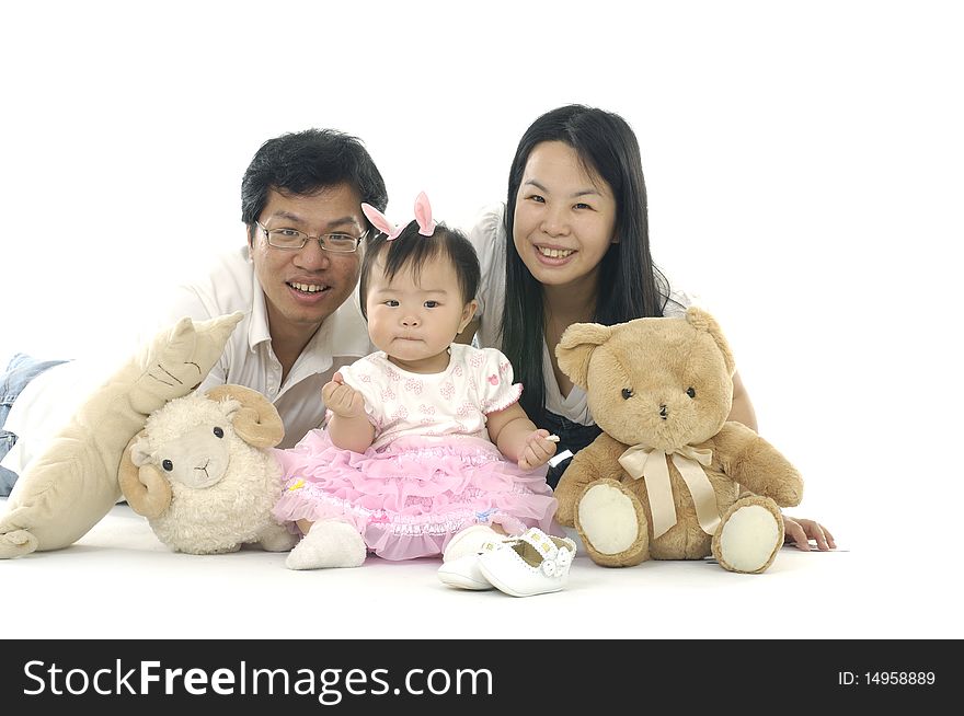 Lovely asian family with animal toys