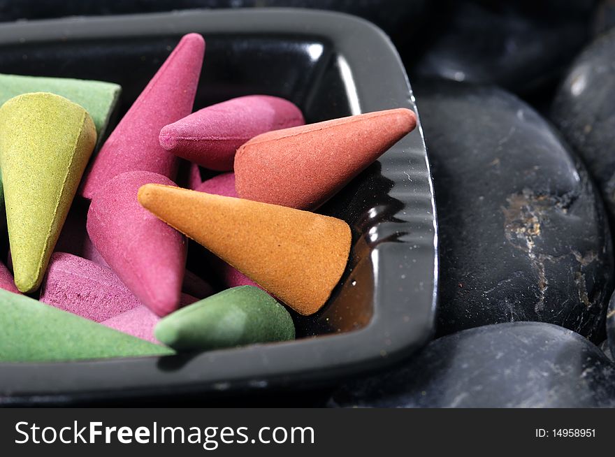 Bowl of spa scented on pebbles