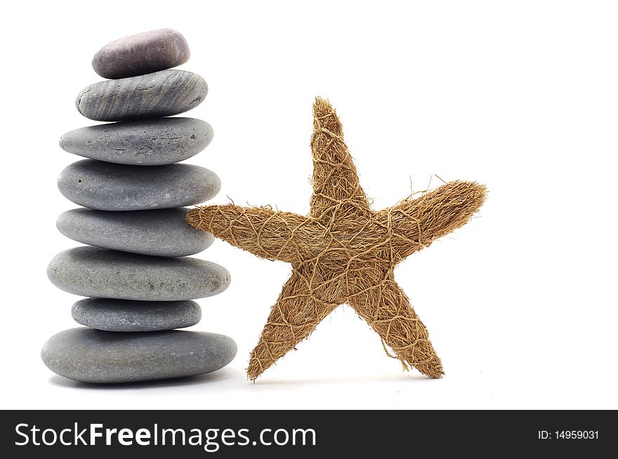 Stack stones with starfish on white. Stack stones with starfish on white