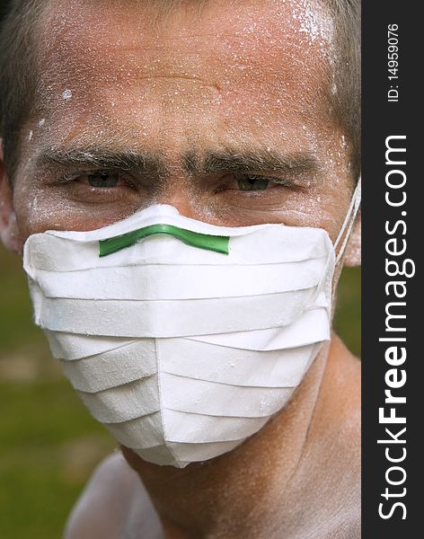 Headshot of a worker in protective mask