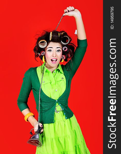 Shot of a funny  woman housewife dressed in retro style. Shot of a funny  woman housewife dressed in retro style.