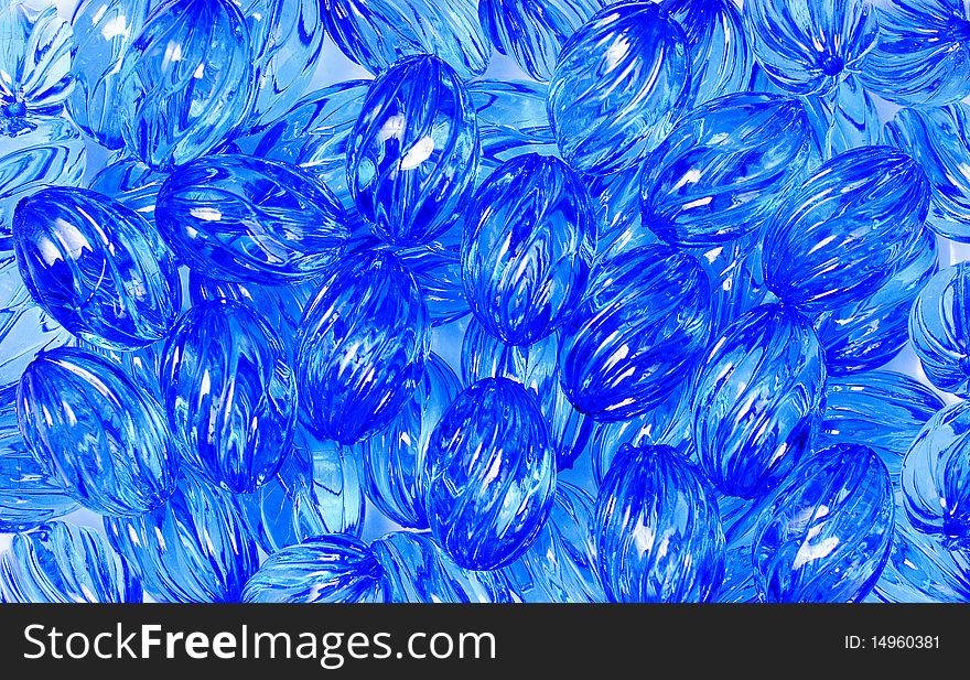 Beautiful blue glass bead background for design