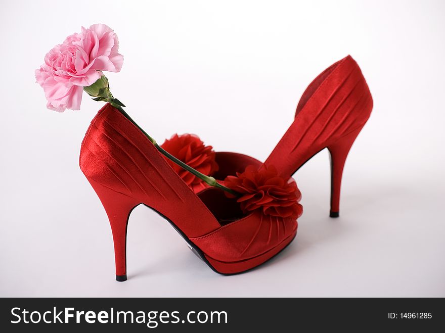 Red shoes and carnation