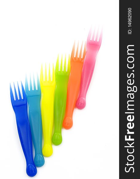 Row of Colorful plastic forks