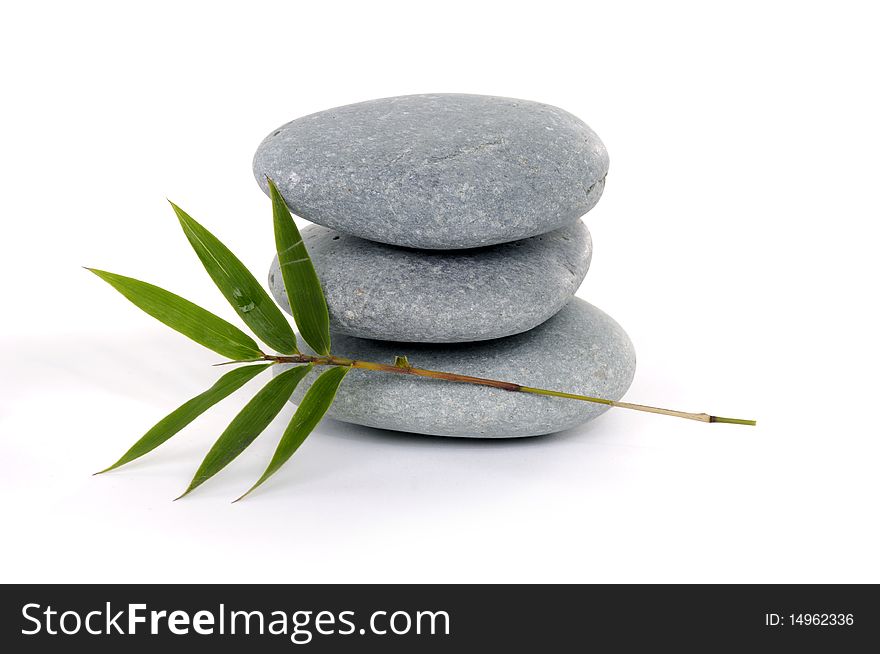 Nature background â€“ bamboo leaves and stones. Nature background â€“ bamboo leaves and stones