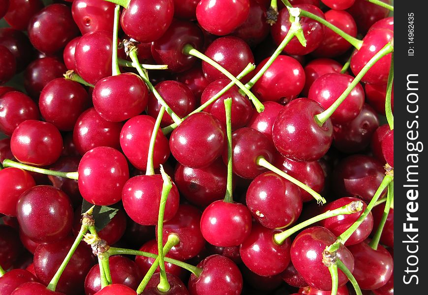 Close up wonderful red cherries background