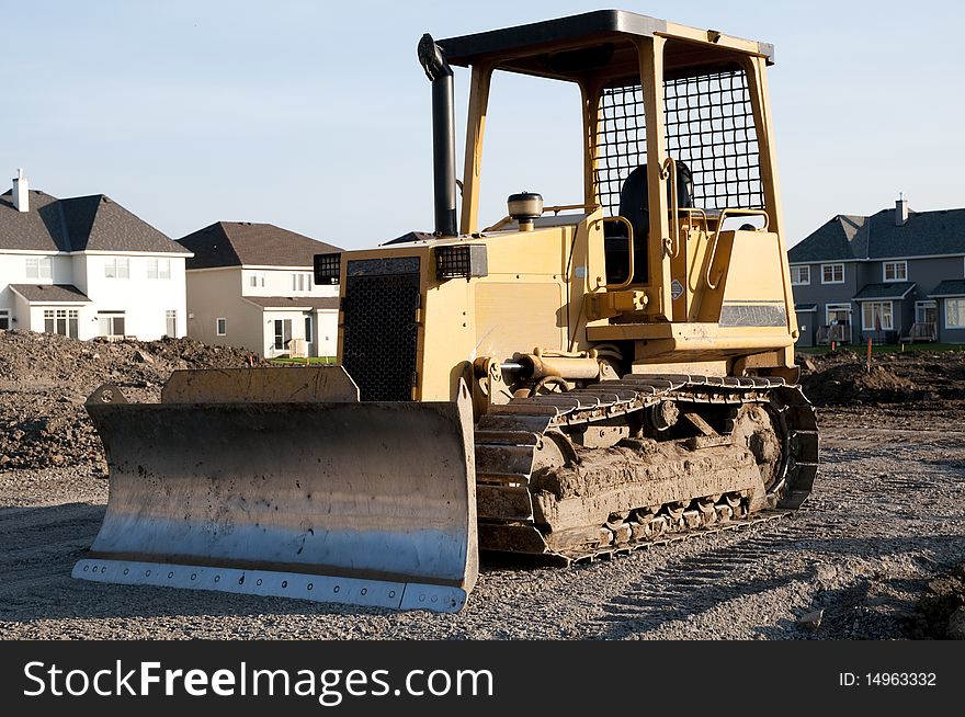 Bulldozer on new home construction site. Bulldozer on new home construction site