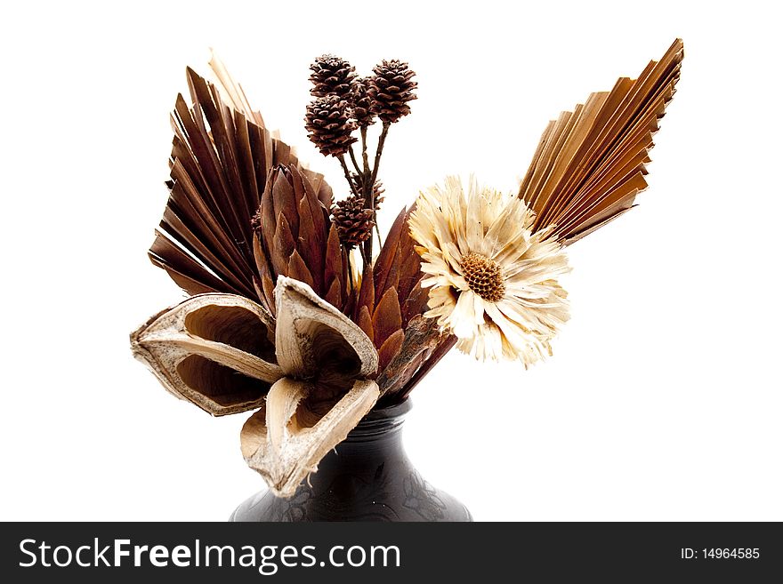 Dried flower blossoms in the vase. Dried flower blossoms in the vase