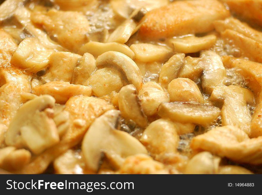 Fried mushroom on a frying-pan