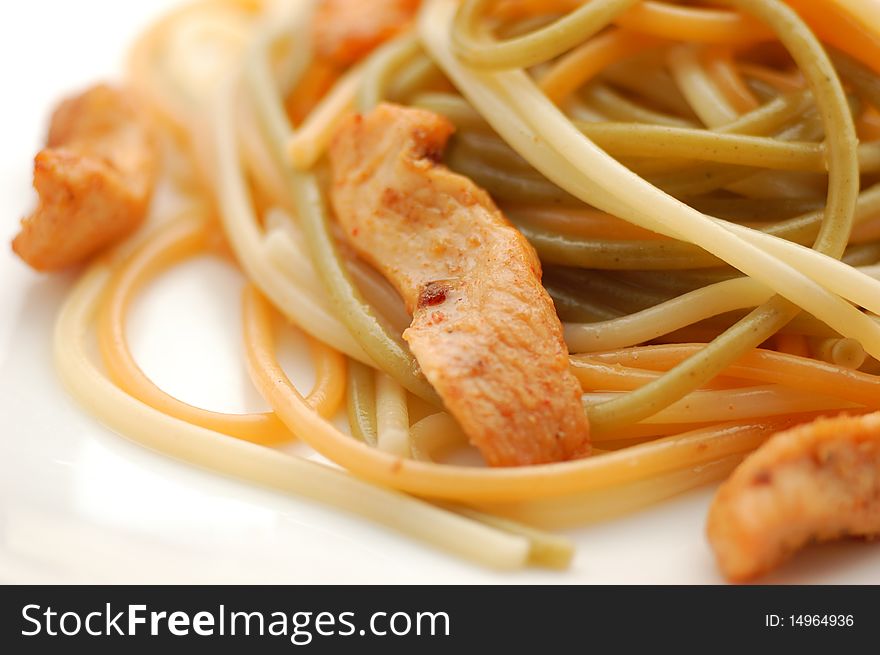 Spaguetti on a plate on white