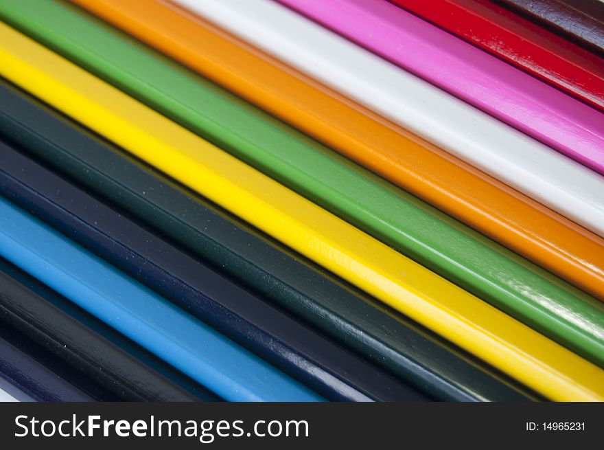 Close up of many colored pencils isolated