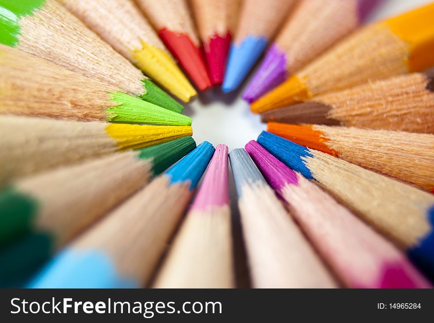 Close up of many colored pencils isolated