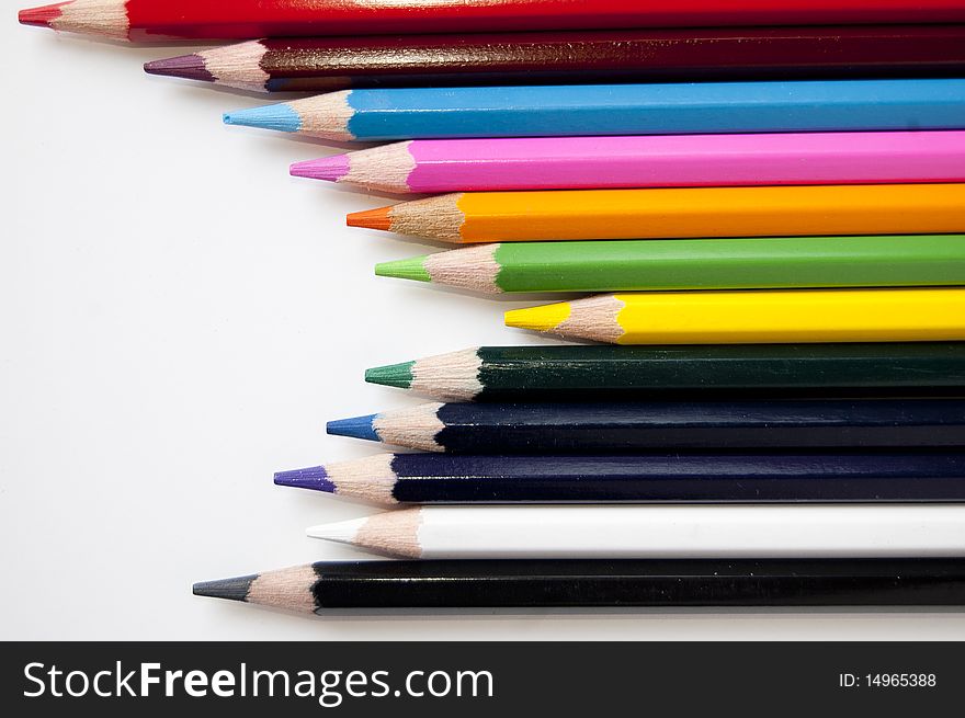 Close up of many colored pencils isolated