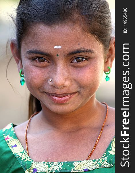 Smiling Indian Teenage Girl Looking at the Camera