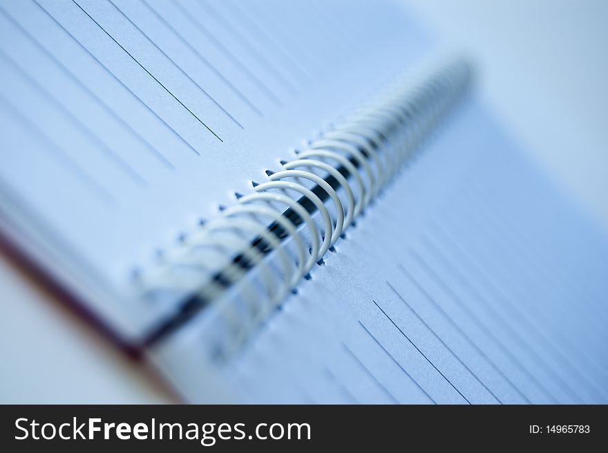 A notebook isolated on a white background. A notebook isolated on a white background