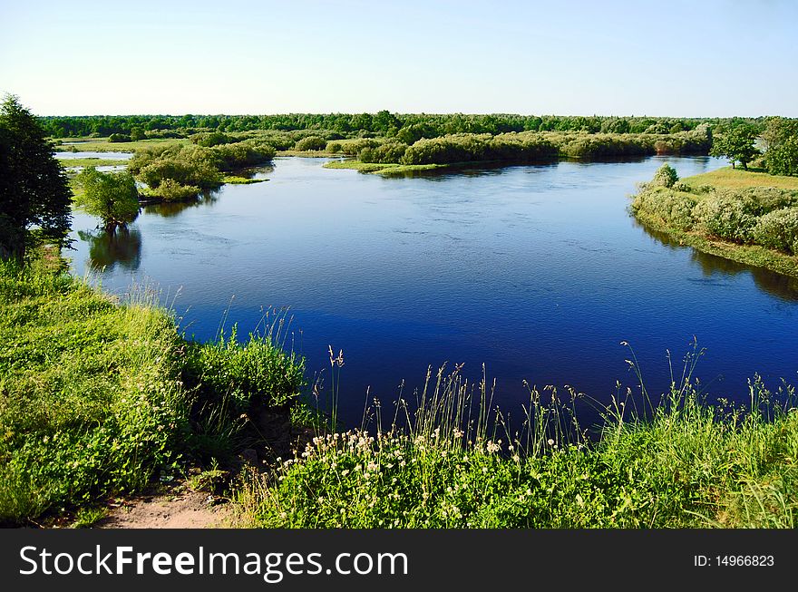 Beautiful landscape with a river and the sky. Beautiful landscape with a river and the sky