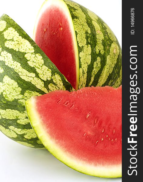 Piece cut out of watermelon on the white background. Piece cut out of watermelon on the white background