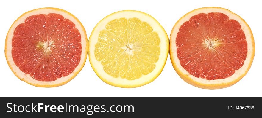 Group of three fresh red and yellow grapefruits isoltaed on white with clipping path. Group of three fresh red and yellow grapefruits isoltaed on white with clipping path