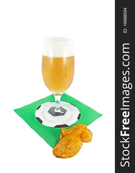 Glass of cold beer and potato crisp pleasure for fans
